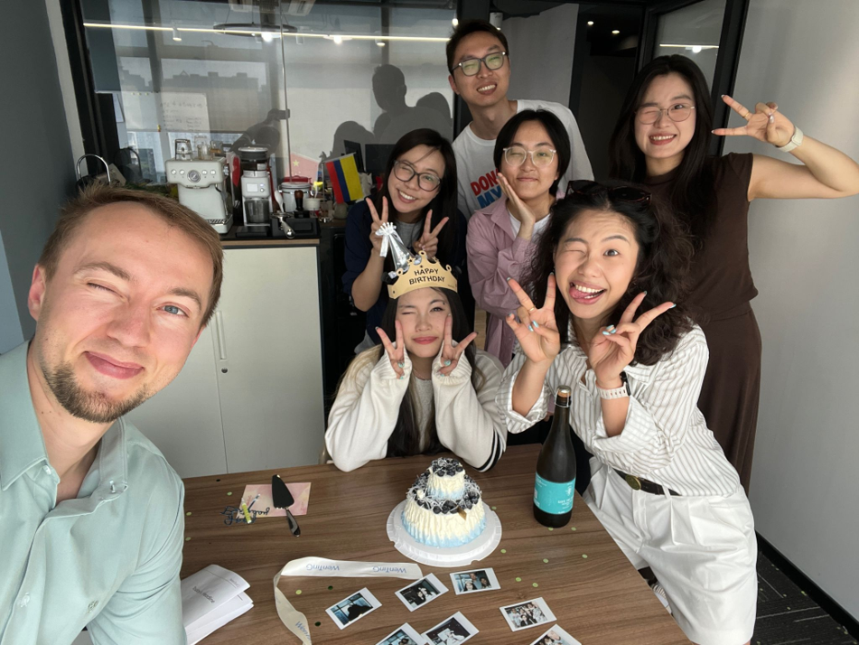 Orient Path team celebrating birthdays